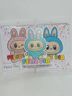 PINCHE TOPPERS FELIZ DIA MODELOS SURTIDOS x3u.(POMPI DU )